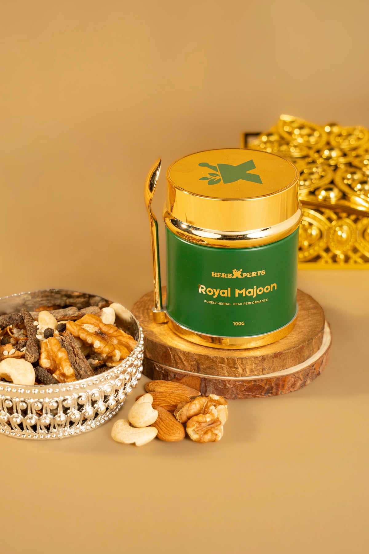 Walnuts, cashews and almonds next to the jar